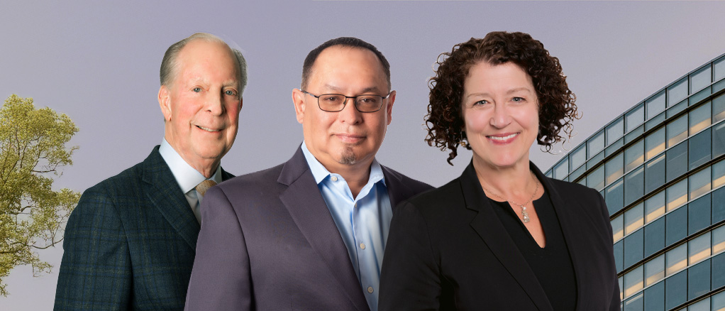 Bankers in front of an office building.