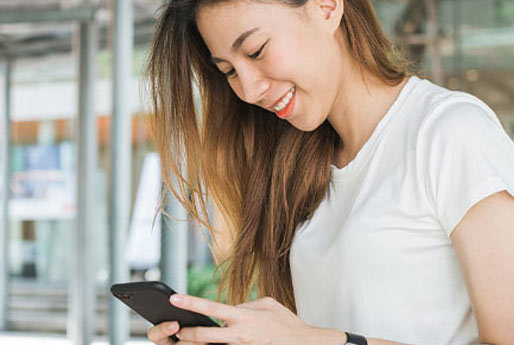 Young woman using her smartphone