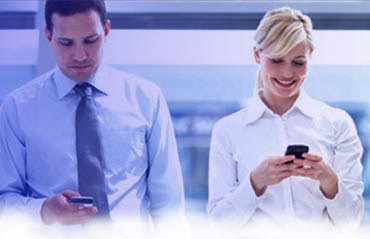 Two people using business mobile banking app