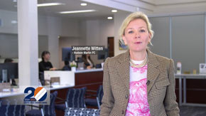 Jeannette Witten speaking in a bank office